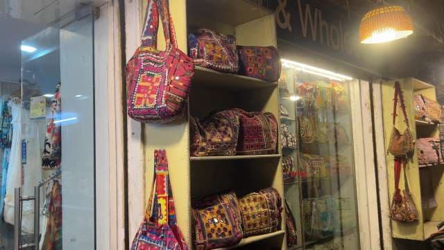 Colorful Traditional Embroidered Bags Displayed at Market Shop