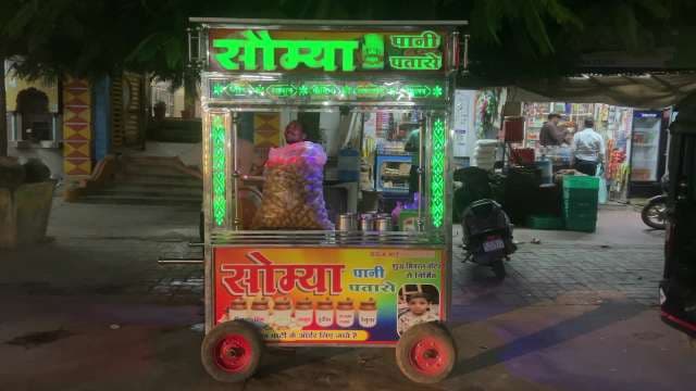 Colorful Pani Puri Cart Serving Street Food at Night