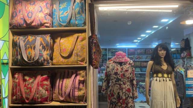 Colorful Handmade Bags and Boho Dresses in Boutique Display
