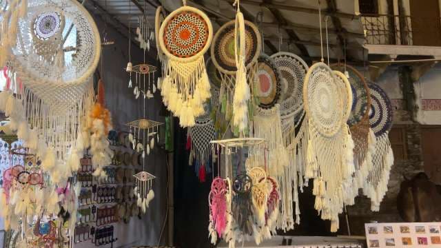 Colorful Handmade Dreamcatchers on Display at Market Stall