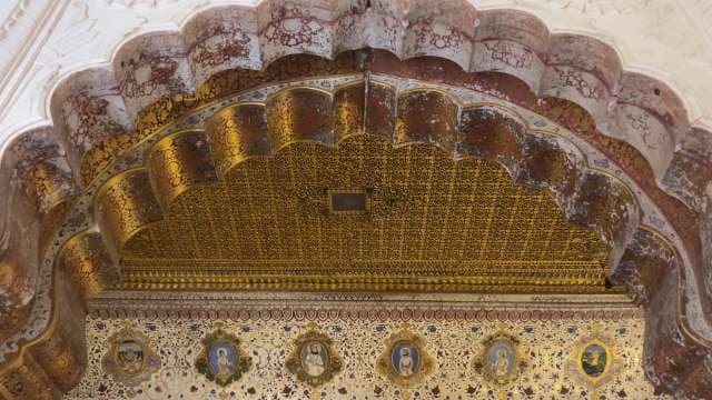 Intricate Golden Ornate Archway in Historic Palace