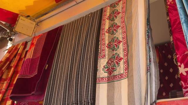 Colorful Market Display of Traditional Indian Fabrics