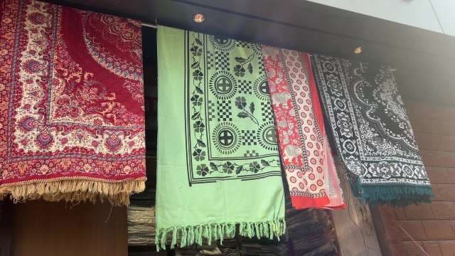 Colorful Traditional Fabrics Displayed at Indian Textile Market
