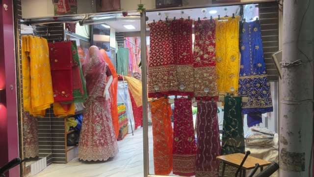 Colorful Indian Saree Display at Traditional Boutique