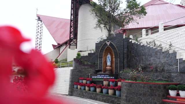 Stunning View of Mary Shrine at Red-Roofed Church Manado