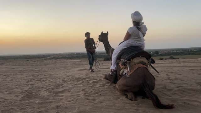 Camel Safari Adventure at Sunset in the Desert