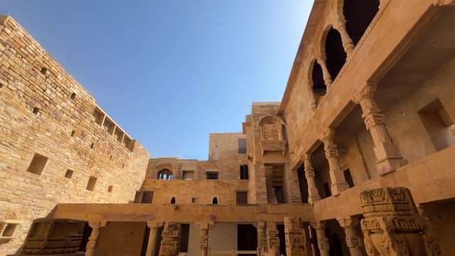 Exploring Ornate Stone Architecture in Jaisalmer Fort Courtyard