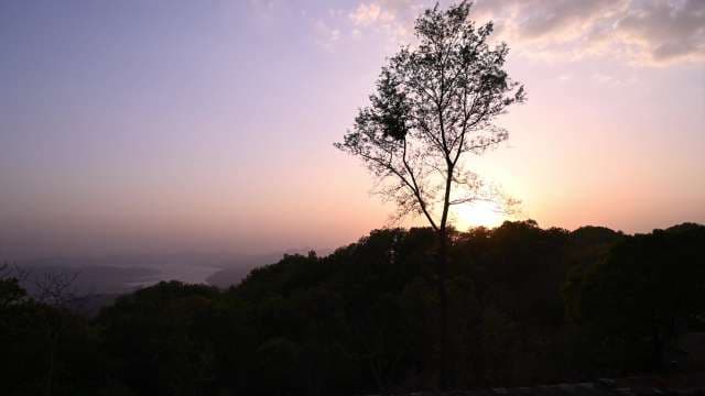 Timelapse Majestic Sunset Over Serene Mountain Landscape