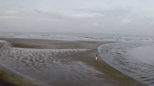Serene Walk Along an Empty Beach at Goa