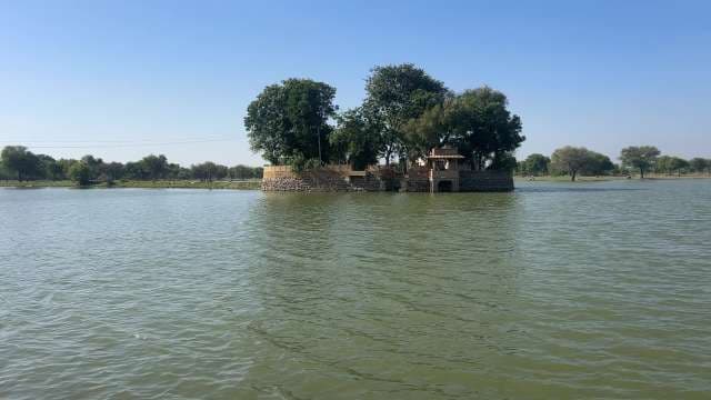Ancient Island Temple Amid Serene Lake Waters