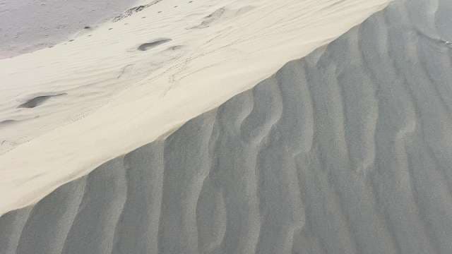 Spectacular Wind Patterns on Towering Sand Dune Ridge