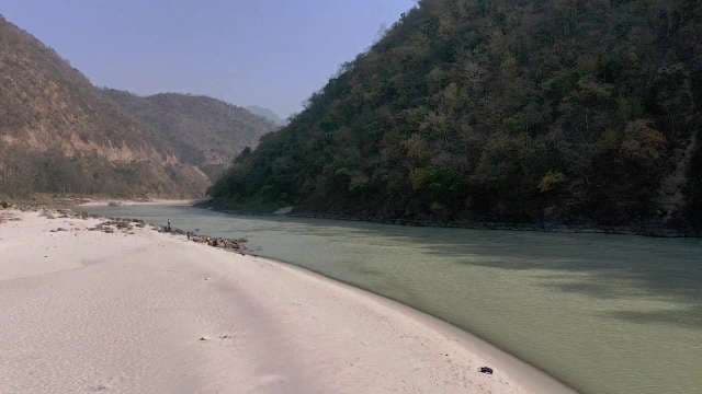 Serene Mountain River Bend in Natural Landscape