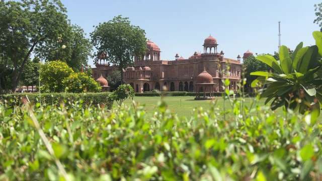 Majestic Laxmi Niwas Palace Amid Lush Green Gardens
