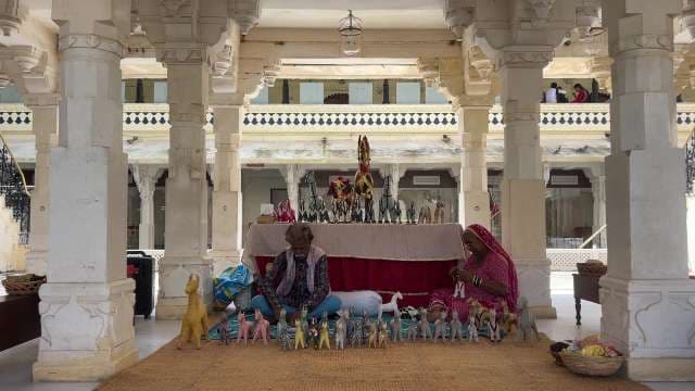 Rajasthani Artisans Crafting Traditional Fabric Horses in Palace Courtyard