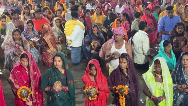Devotees Gather for Chhath Puja Rituals on Riverbank
