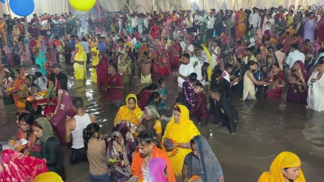 Colorful Chhath Puja Rituals in India: Devotees Gather in Water