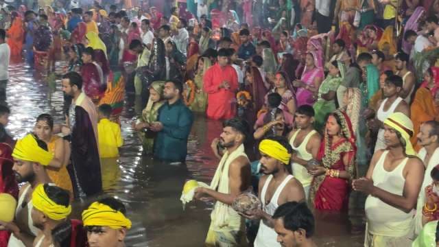 Hindu Devotees Celebrate Chhath Puja in Sacred River Ritual