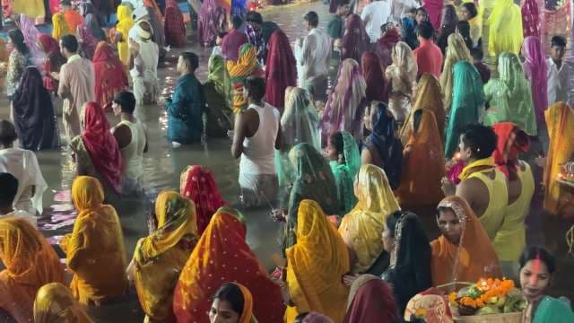 Vibrant Chhath Puja Celebration on the Riverbank in India