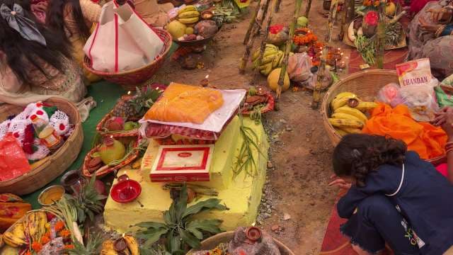 Chhath Puja Prayer Ritual by the Riverbank in Bihar