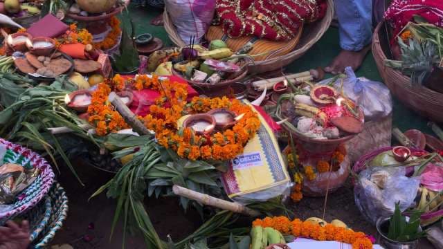 Traditional Chhath Puja Offerings with Fruits and Diyas in India