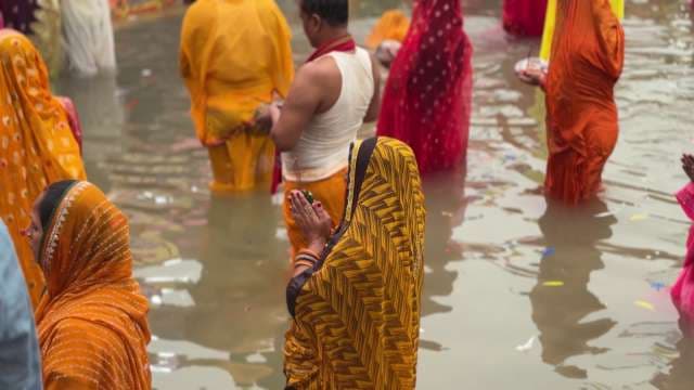 Hindu Devotees Perform River Ritual for Holy Festival