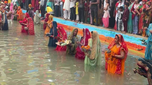 Colorful Chhath Puja Rituals at Riverbank in Bihar