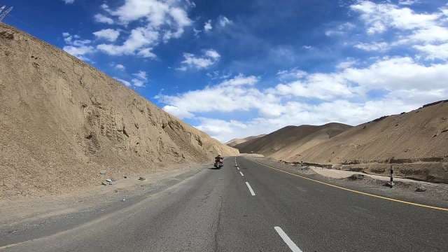 Epic Motorcycle Adventure Through Ladakh's Dramatic Valleys
