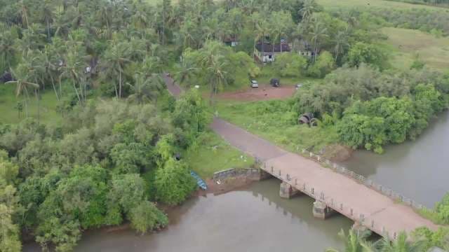 Stunning Aerial View of Tropical Bridge and River