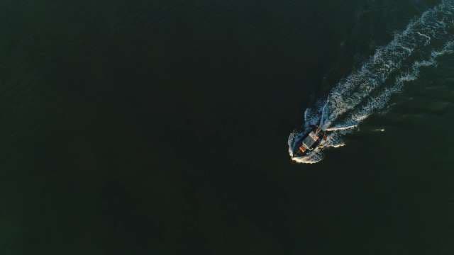 Aerial Boat Wake - Drone View of Speed Boat on Water