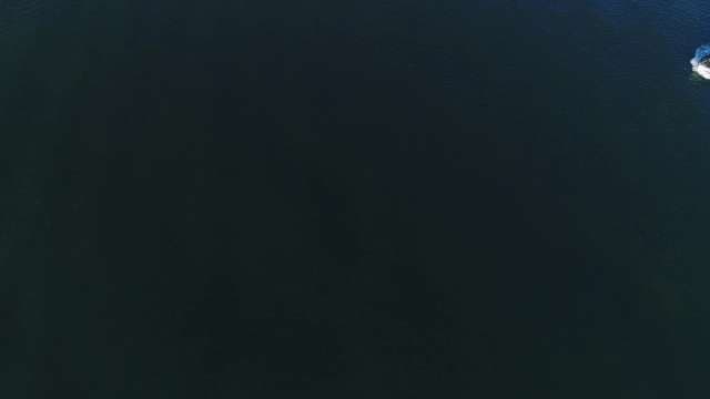 Serene Dark Cosmic Background with Boat Passing By