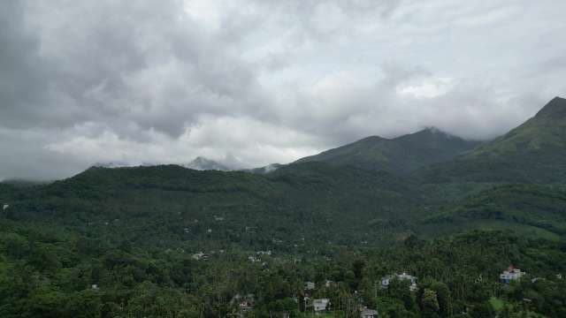 Misty Mountain Landscape with Lush Forest Valley