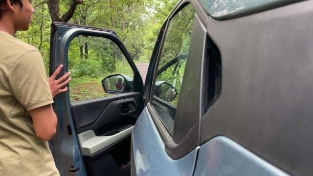 A Boy Entering the Car in Forest Setting