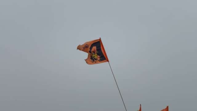 Saffron Flag with Hindu Religious Symbolism Flying High