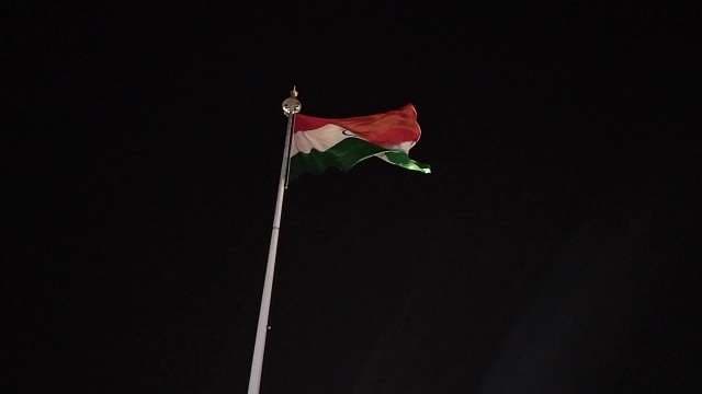 Indian Flag Waving Against Night Sky