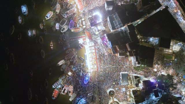 Bustling Harbor at Night: Aerial City Port View