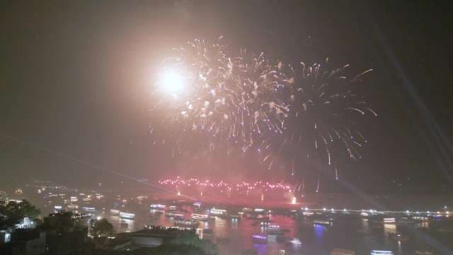 Spectacular Fireworks Display Over the River at Night