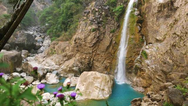 Stunning Mountain Waterfall and Turquoise Pool Nature Scene