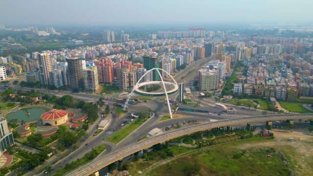 Modern City Skyline With Iconic Arch Bridge Aerial View