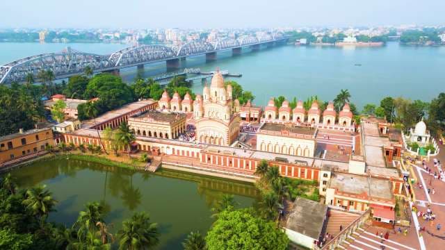Varanasi's Sacred Temples and Historic Bridge Aerial View