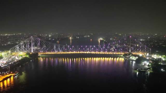 Stunning Night View of Illuminated Howrah Bridge in Kolkata