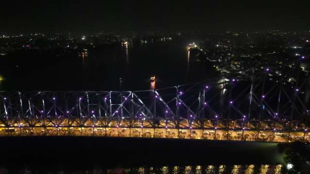 Aerial Night View of the Iconic Howrah Bridge in Kolkata
