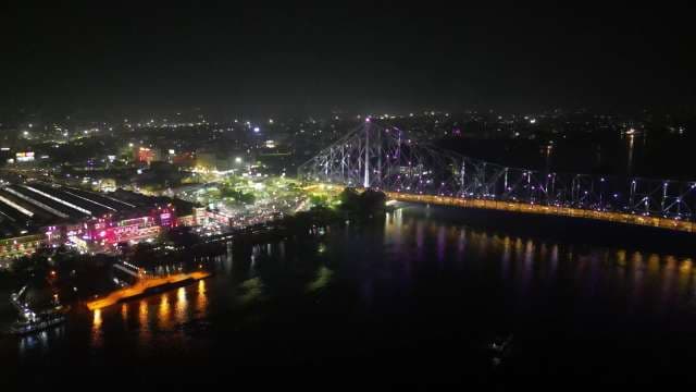 Stunning Night View of Howrah Bridge and Kolkata Cityscape
