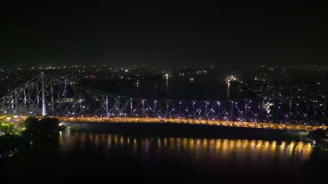 Stunning Night View of the Iconic Howrah Bridge in Kolkata India
