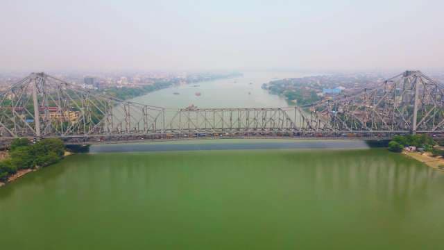 Majestic Aerial View of Howrah Bridge Over the Hooghly River