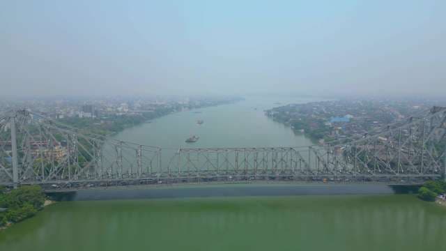 Aerial View of the Iconic Howrah Bridge and Hooghly River in Kolkata