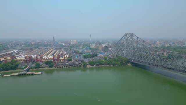 Iconic Howrah Bridge and Railway Station Aerial View in Kolkata, India