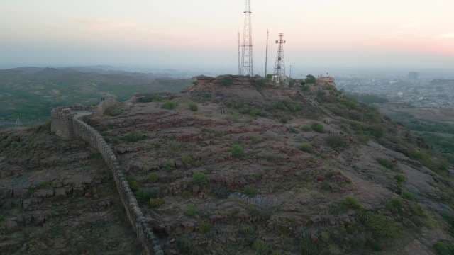Scenic Aerial View of Ancient Fort Walls and Modern Communication Towers