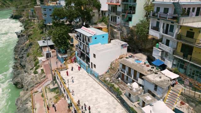 Aerial View of Omkarananda Public School and Ganges River in Rishikesh