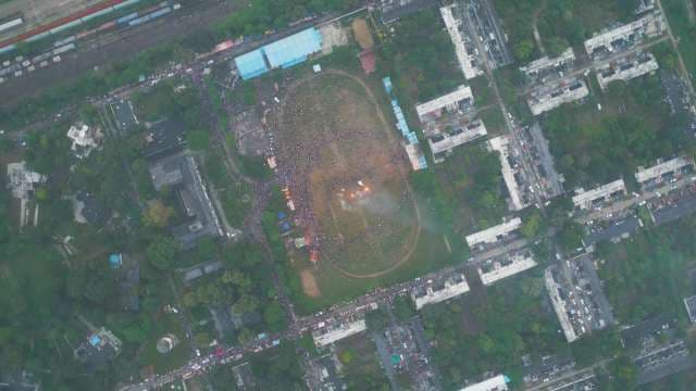 Stunning Aerial View of Large Public Gathering During a Festival