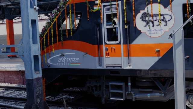 Saffron Vande Bharat Express Train Decorated with Vibrant Flowers in India